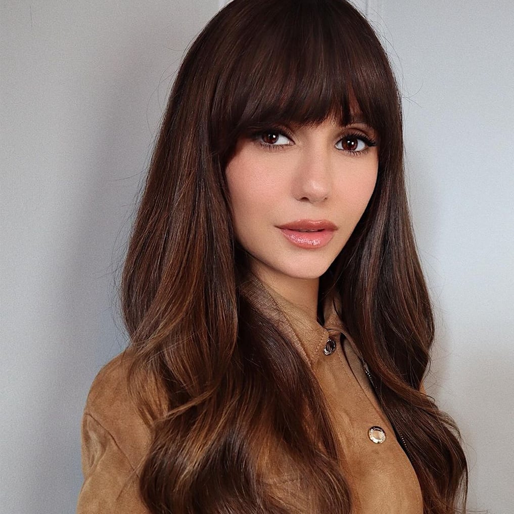 Mid-Back Layers With Full Bangs — Classy Bangs Style