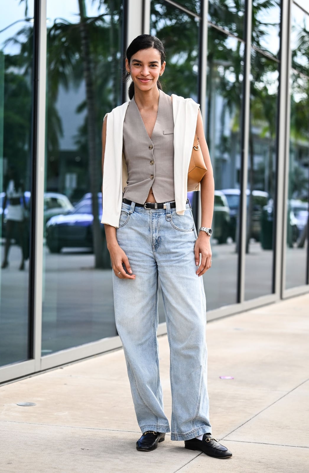 Relaxed Black Loafers With Wide Leg Jeans And Gray Vest — Classy Black Loafers Outfit