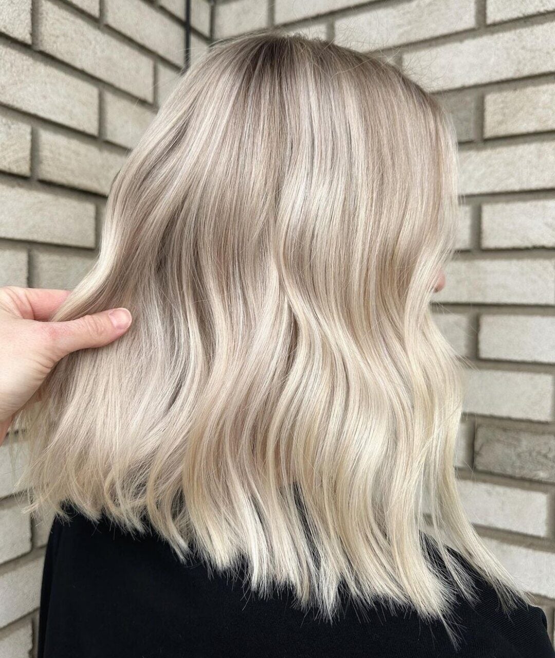 Ash Blonde Collarbone Waves with Subtle Highlights Ash Blonde Collarbone Waves with Subtle Highlights — Classy Blonde Wavy Hair