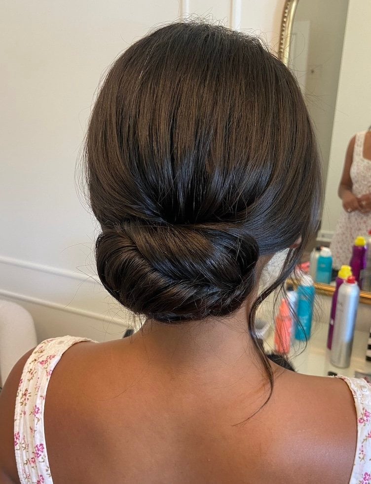 Textured Dark Brown Low Bun Wispy Pieces — Classy Bridal Hairstyles