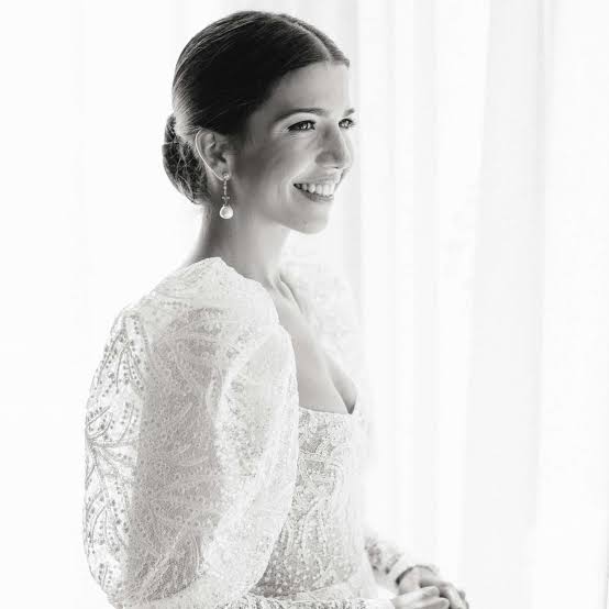 Sleek Dark Brown Low Bun Mid-Back Length — Classy Bridal Hairstyles