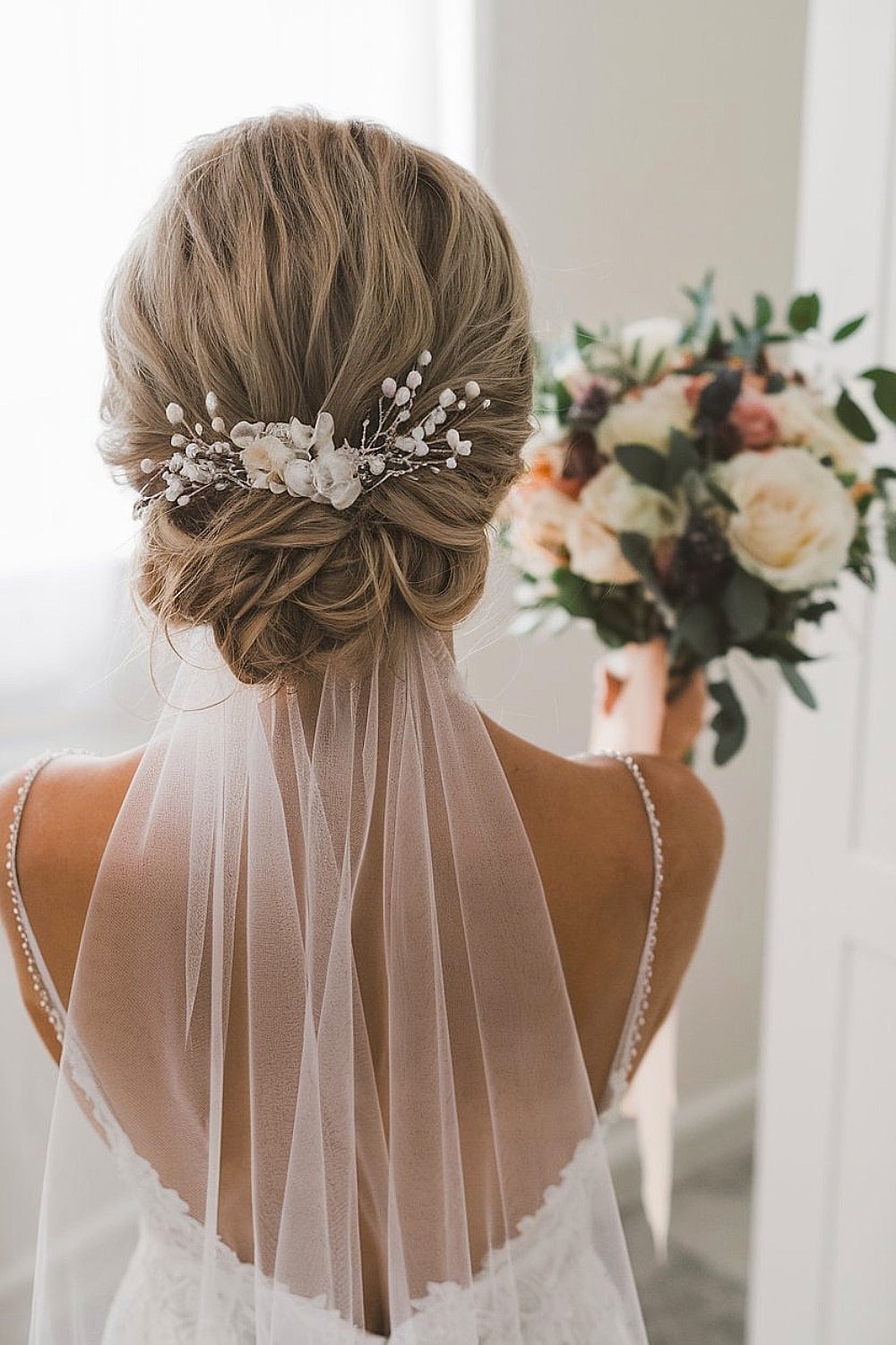 Blonde Braided Updo With Pearl Accessory Blonde Braided Updo With Pearl Accessory — Classy Bridesmaid Hair