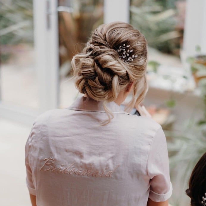 Blonde Braided Updo With Loose Curls Blonde Braided Updo With Loose Curls — Classy Bridesmaid Hair