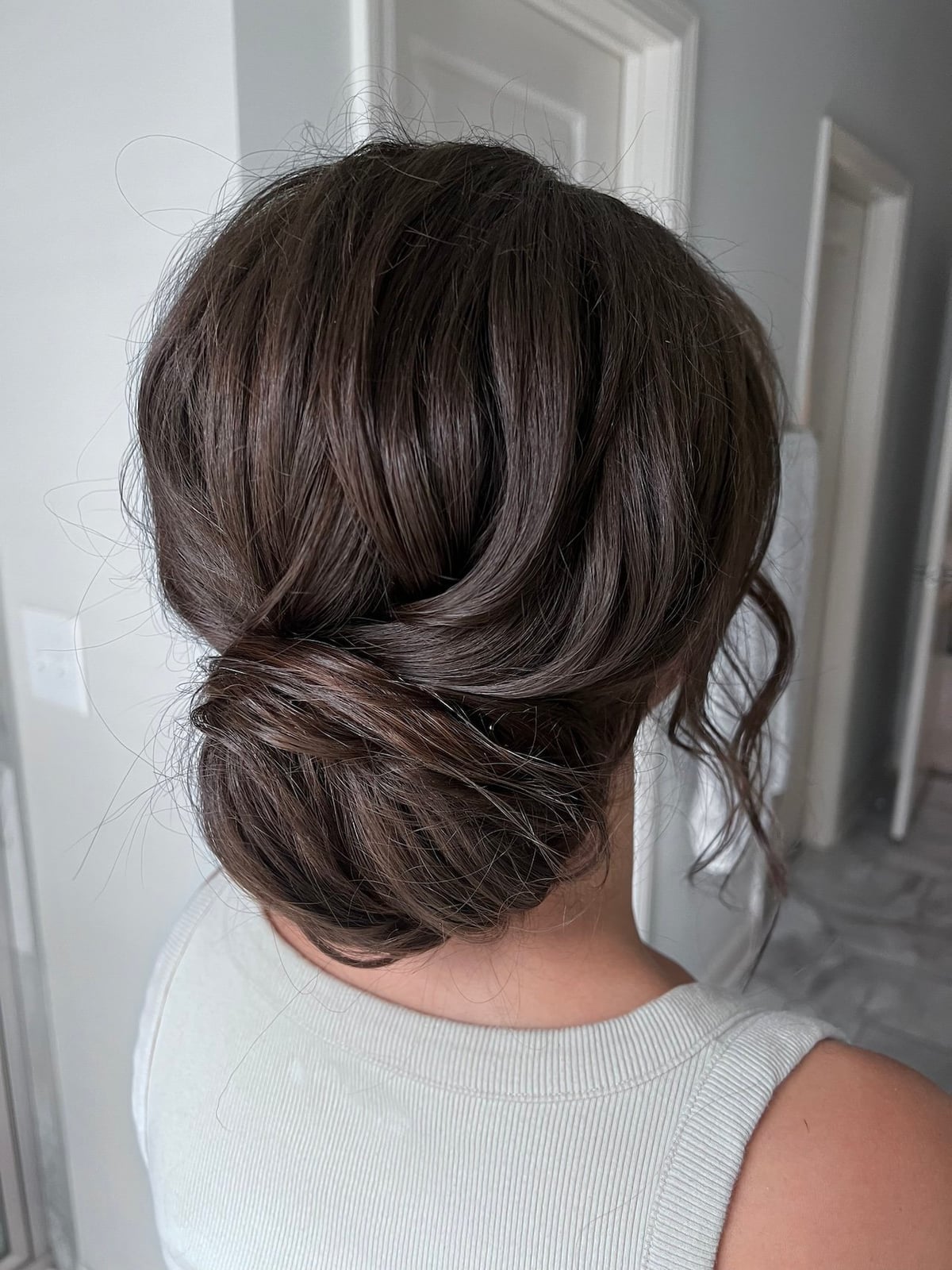 Dark Brown Textured Low Bun Dark Brown Textured Low Bun — Classy Bridesmaid Hair