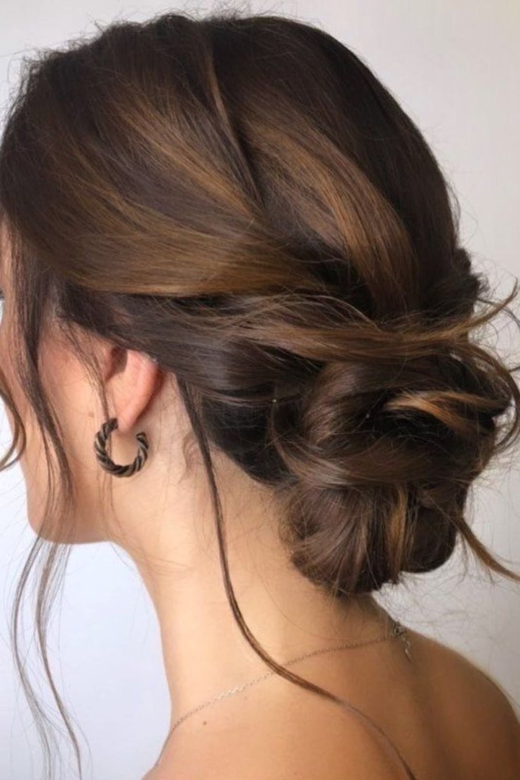 Thick Brown Braided Updo With Flowers Thick Brown Braided Updo With Flowers — Classy Bridesmaid Hair Updo