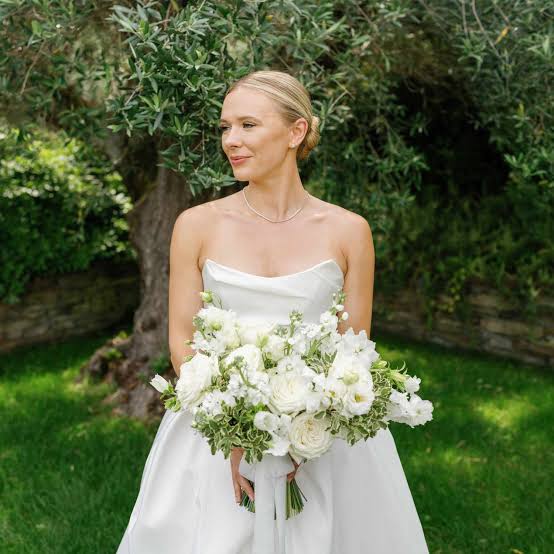 Clean Blonde Low Bun With Middle Part Clean Blonde Low Bun With Middle Part — Classy Bridesmaid Hair Updo