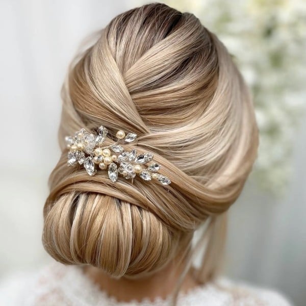 Blonde Twisted Low Bun With Accessory Blonde Twisted Low Bun With Accessory — Classy Bridesmaid Hair Updo