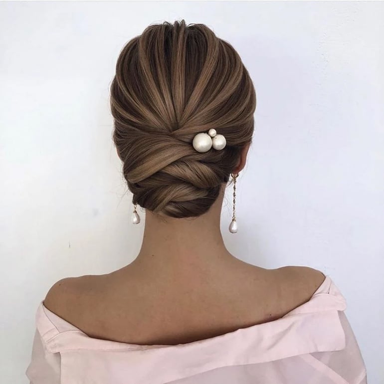 Wavy Dark Blonde Chignon With Pearl Pin Wavy Dark Blonde Chignon With Pearl Pin — Classy Bridesmaid Hairstyles Updo