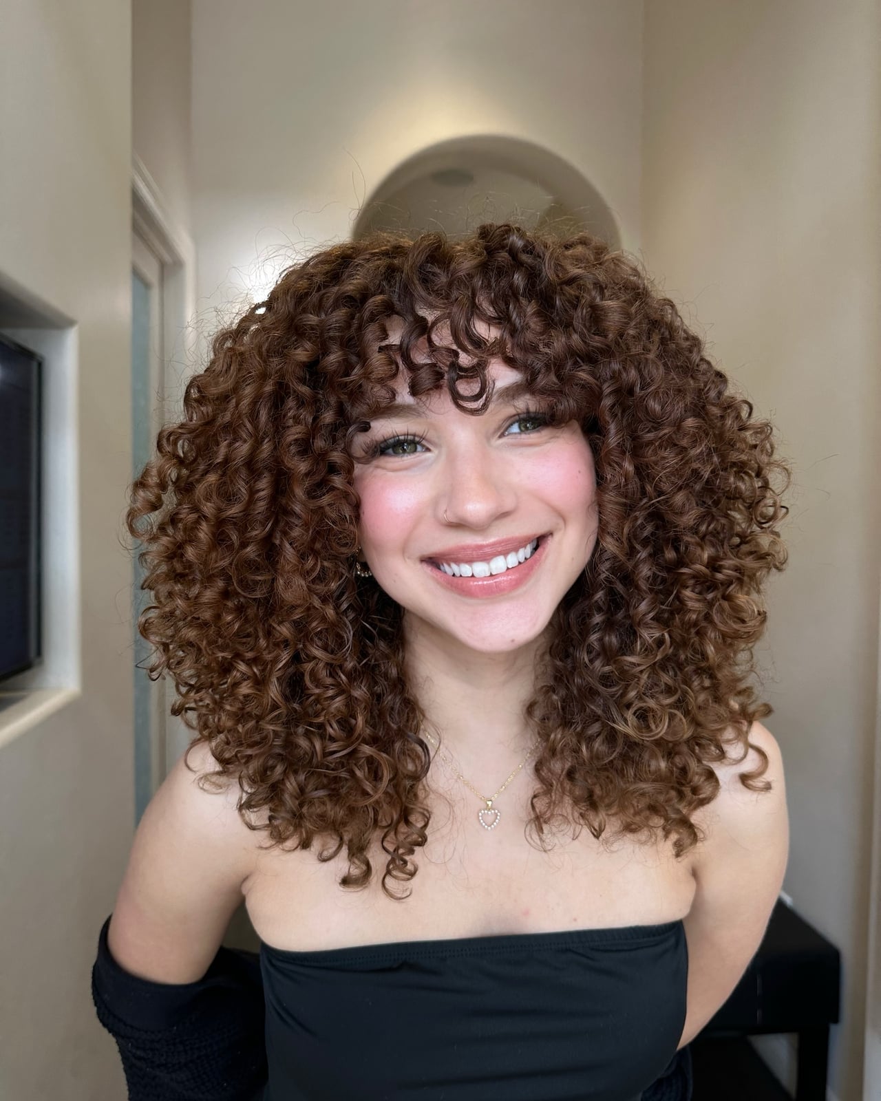 Collarbone Medium Brown Shag With Curtain Bangs — Classy Brown Curly Hair