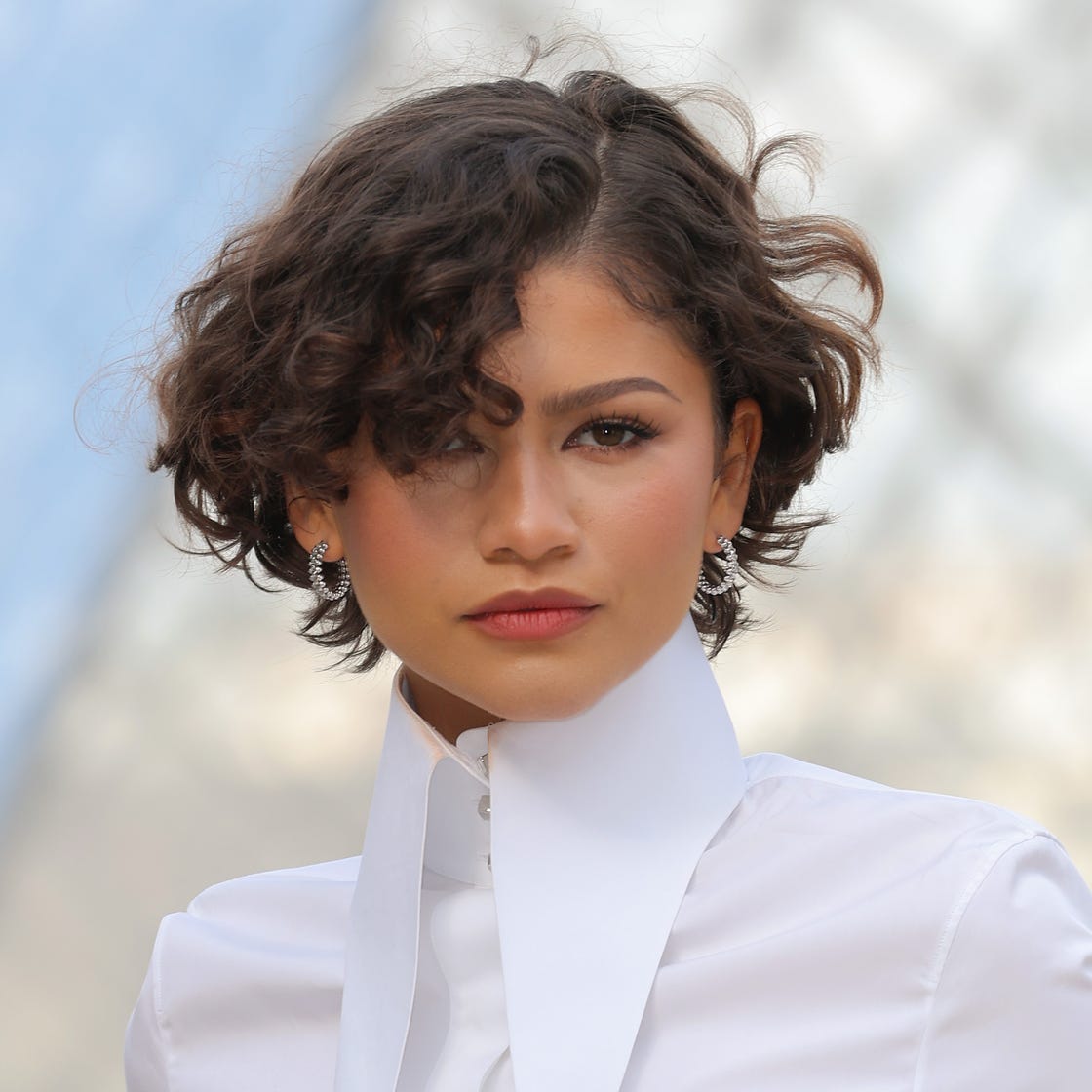 Ear Length Dark Brown Curly Bob With Textured Bangs — Classy Brown Curly Hair