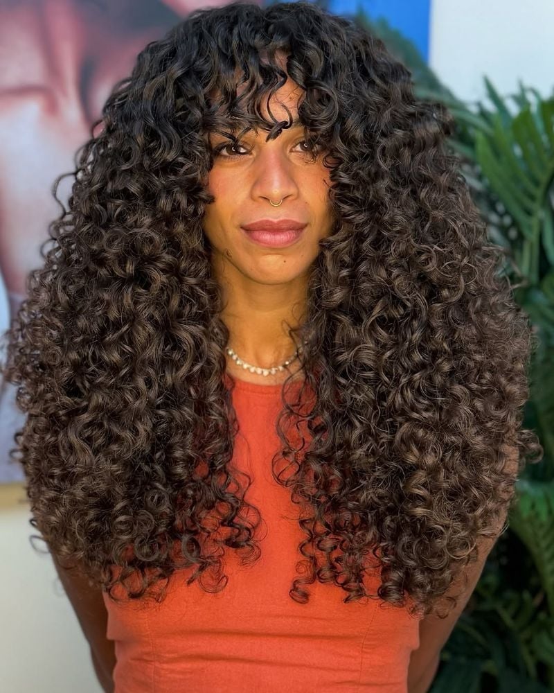 Mid-Back Dark Brown With Curtain Bangs — Classy Brown Curly Hair