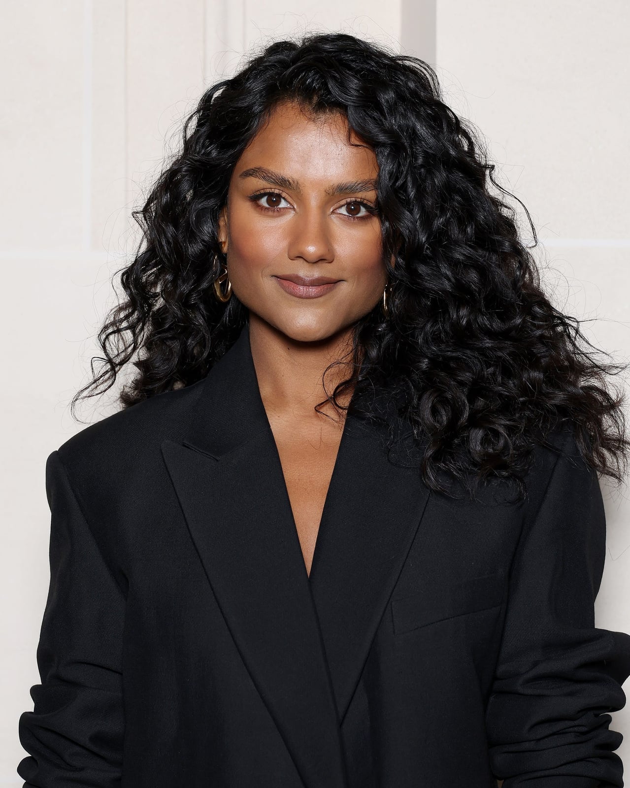 Voluminous Mid-Back Dark Brown Curls With Bangs — Classy Brown Curly Hair