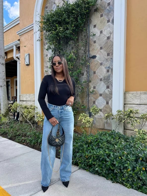 Black top with light wash wide-leg jeans — Classy Casual Church Outfit