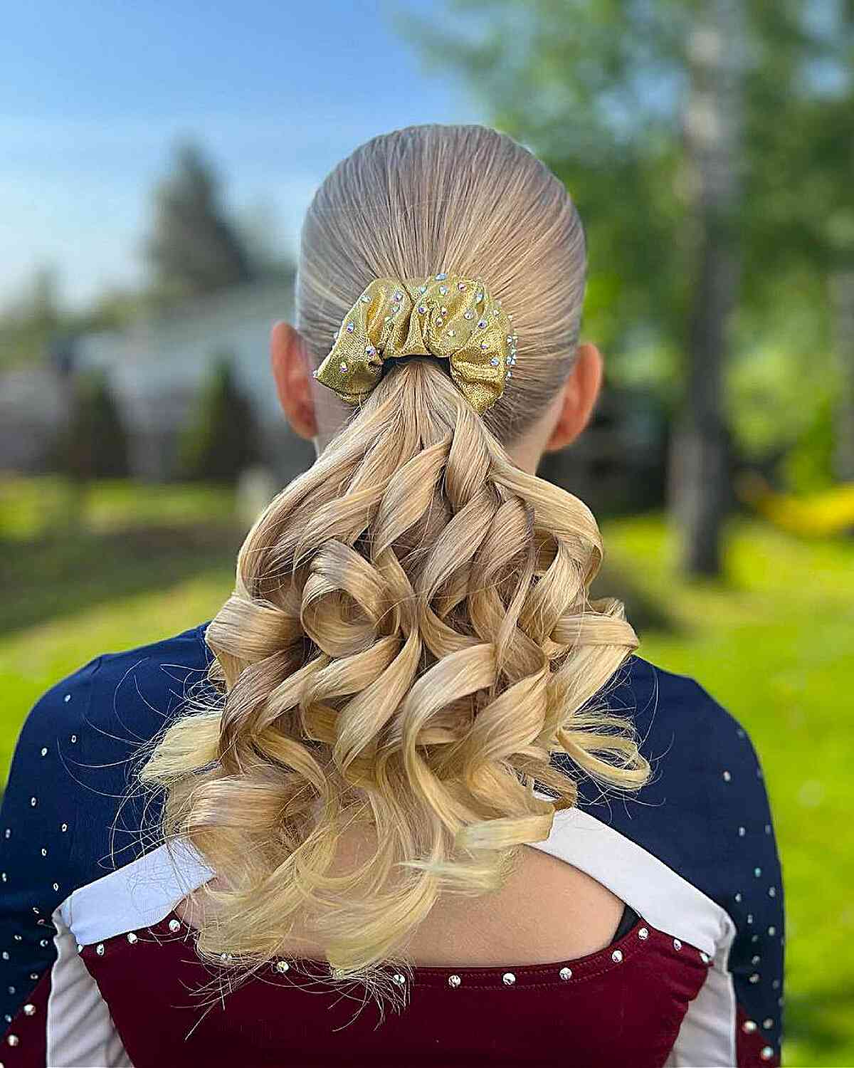 Blonde Ponytail With Defined Curls and Gold Scrunchie — Classy Cheer Hair