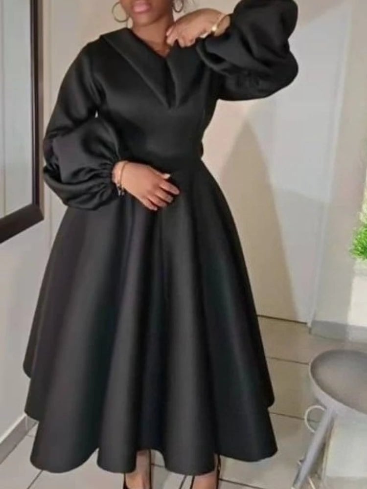 Black A-line dress with puff sleeves Black A-line dress with puff sleeves — Classy Church Outfits