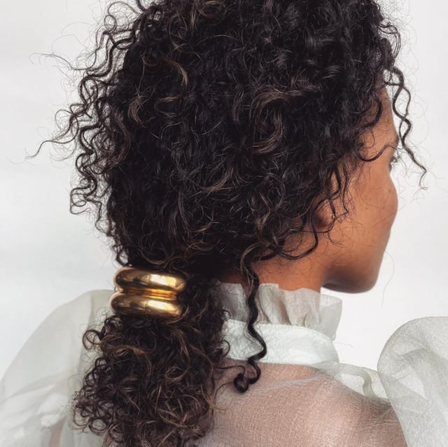 Chin-Length Bob With Sharp Curl Definition — Classy Curly Hair Hairstyles