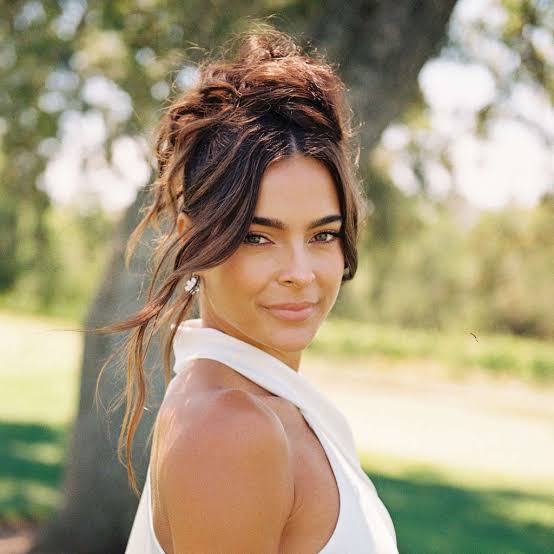 Dark Brown Updo With Loose Tendrils And Soft Bun — Classy Curly Updo