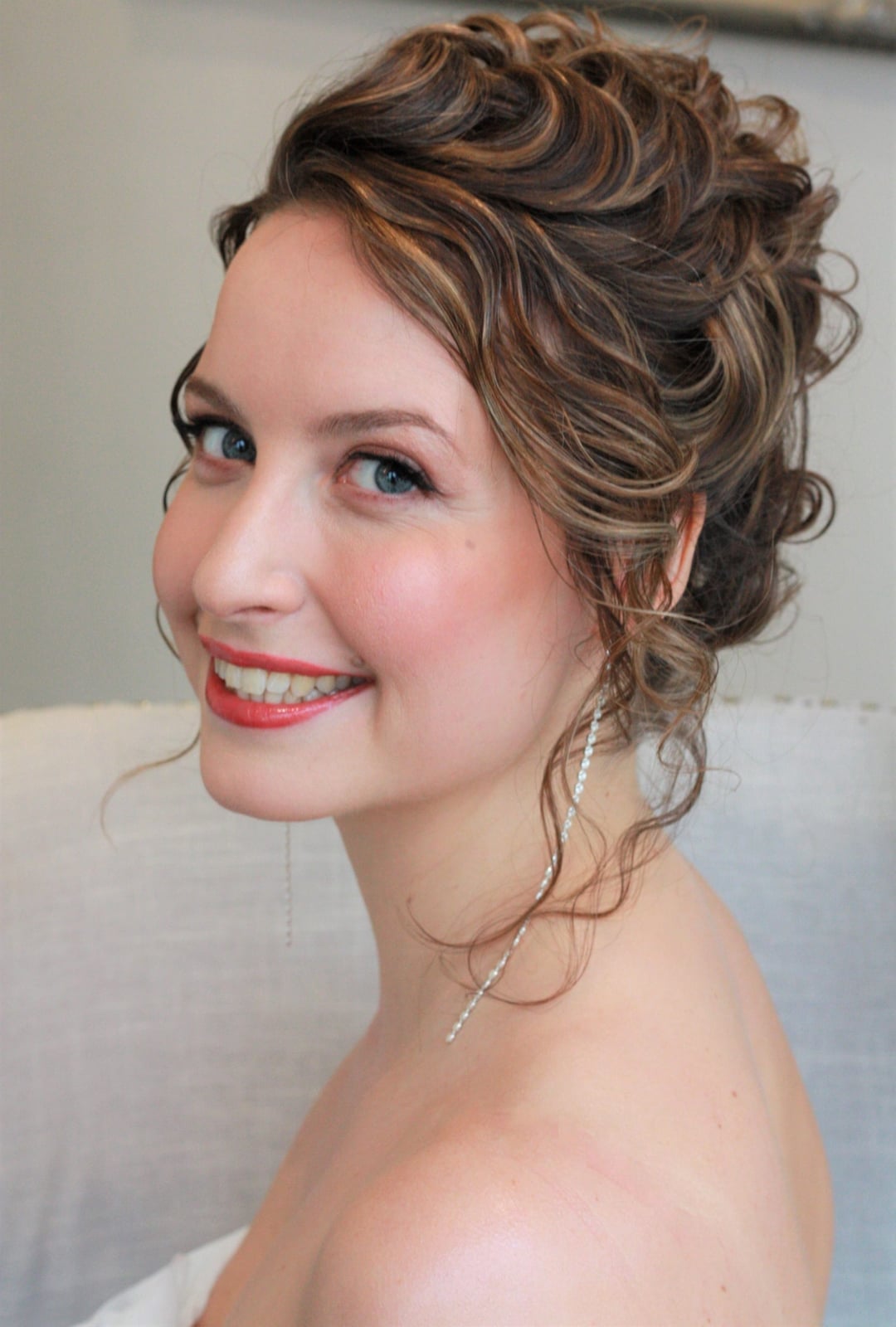 Dark Brown Curly Updo With Blonde Highlights And Tendrils — Classy Curly Updo