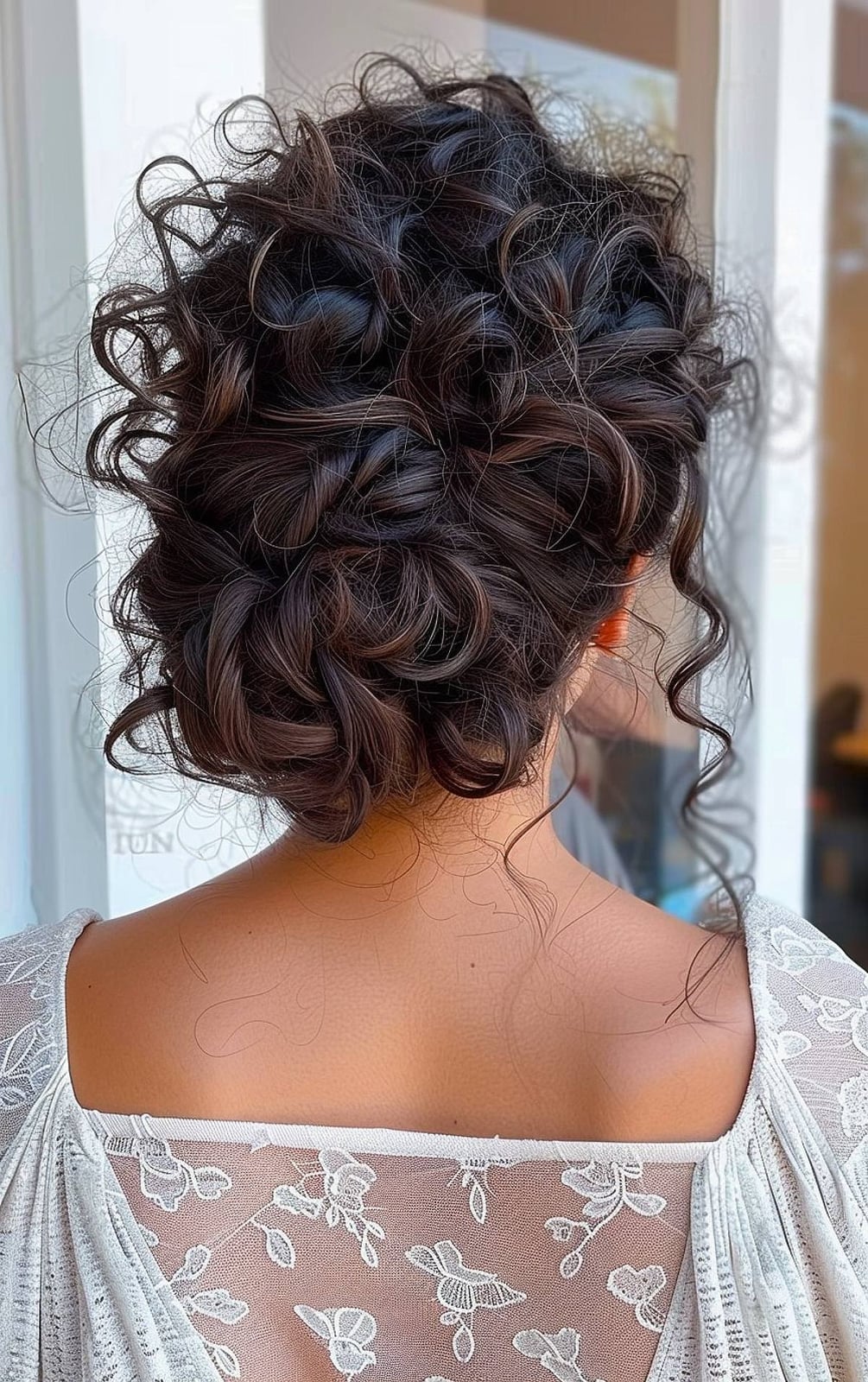 Elegant Dark Brown Curly Updo With Soft Cascading Strands — Classy Curly Updo