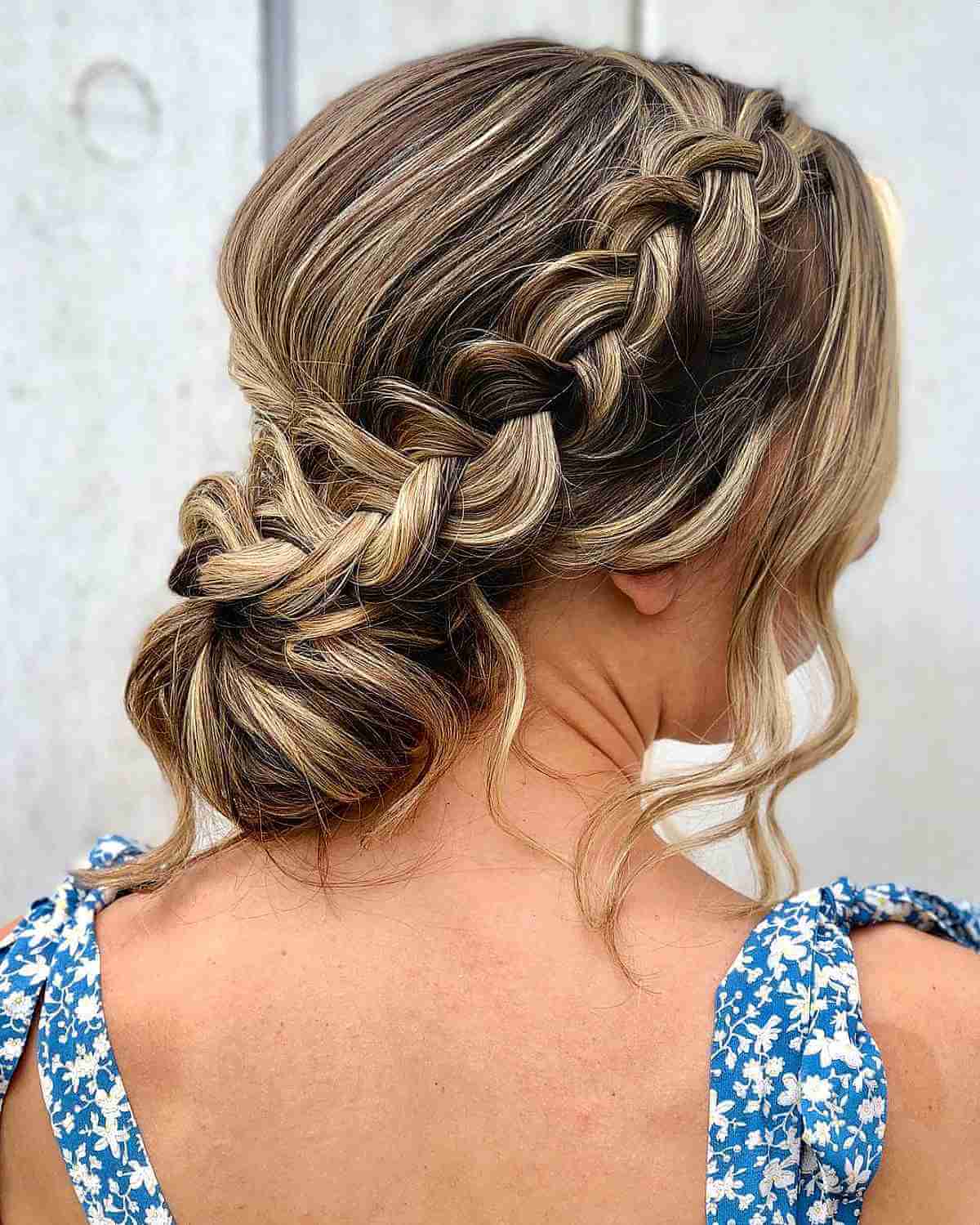 Blonde Braided Low Bun With Loose Strands — Classy Formal Updos