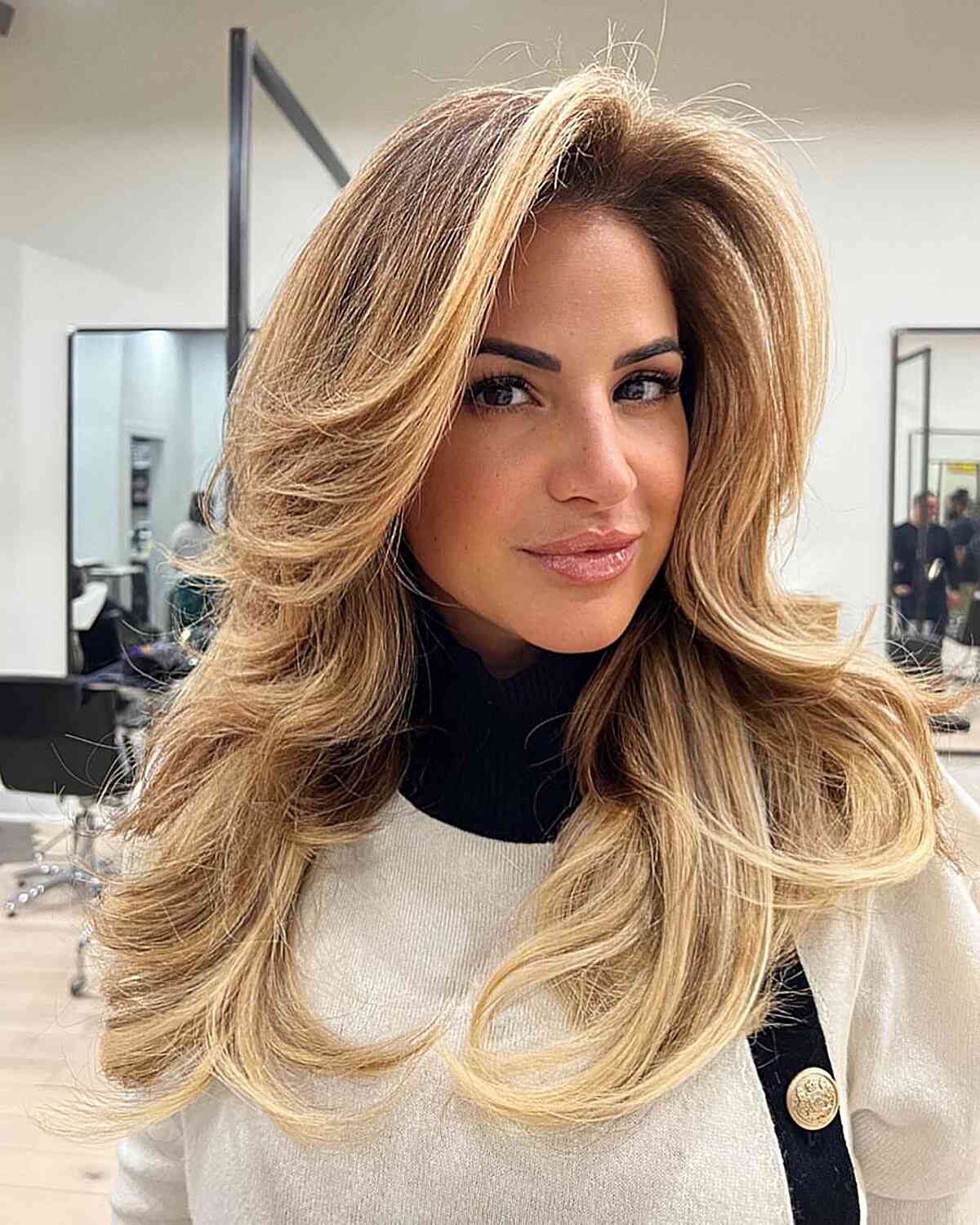 Glamorous Blonde Blowout With Face Framing Layers — Classy Going Out Hairstyles