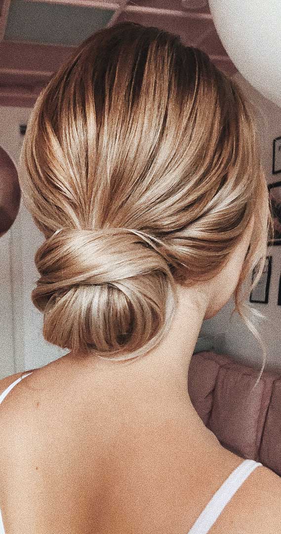 Soft Blonde Low Chignon With Face Framing Strands — Classy Going Out Hairstyles