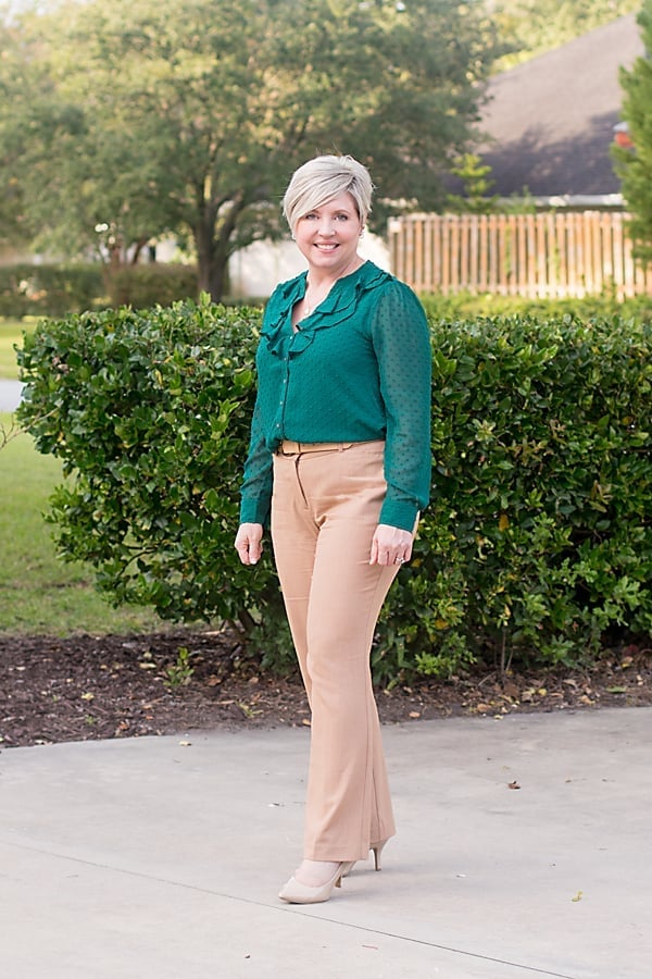 Emerald green sheer dotted blouse with ruffled neckline — Classy Green Top Outfits