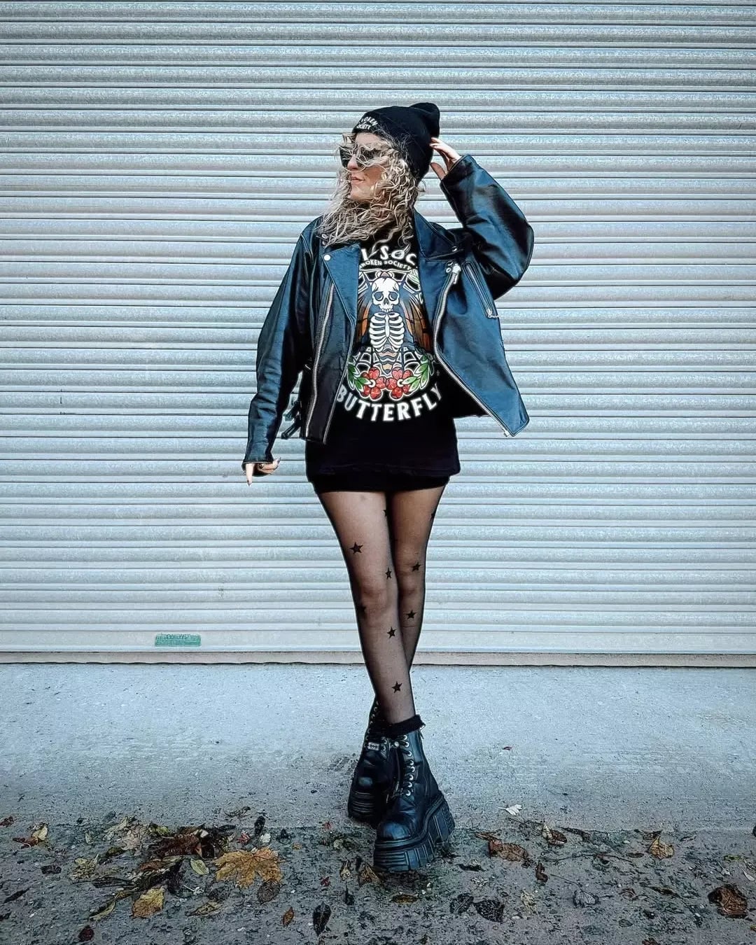 Black leather moto jacket over graphic band t-shirt and mini skirt Black leather moto jacket over graphic band t-shirt and mini skirt — Classy Grunge Outfits