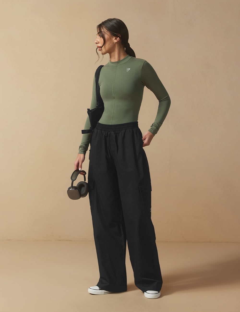 Olive green long sleeve top with black cargo pants Olive green long sleeve top with black cargo pants — Classy Gym Outfits