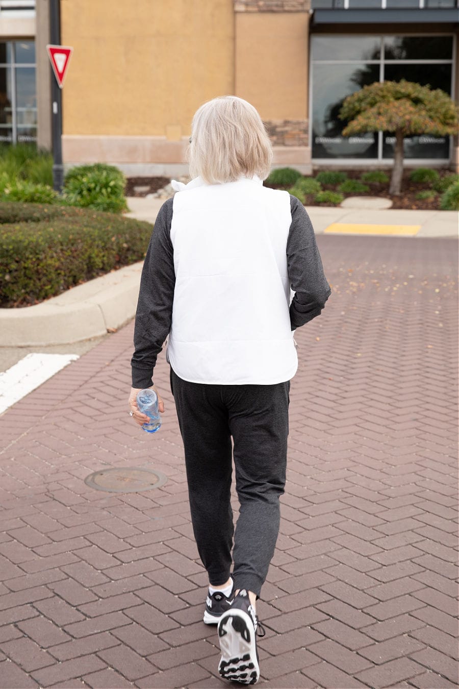 Gray top with white puffer vest and joggers Gray top with white puffer vest and joggers — Classy Gym Outfits