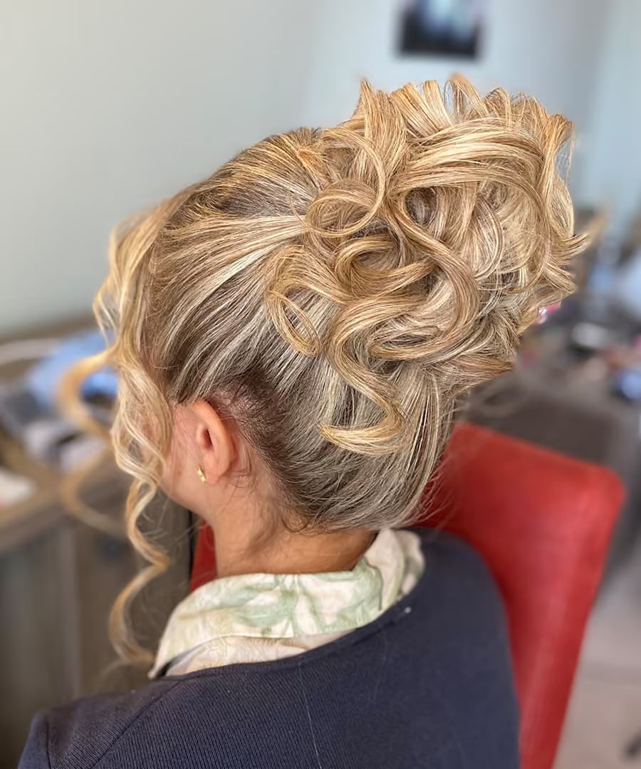 Blonde Curly High Bun With Curls — Classy High Bun Hairstyles