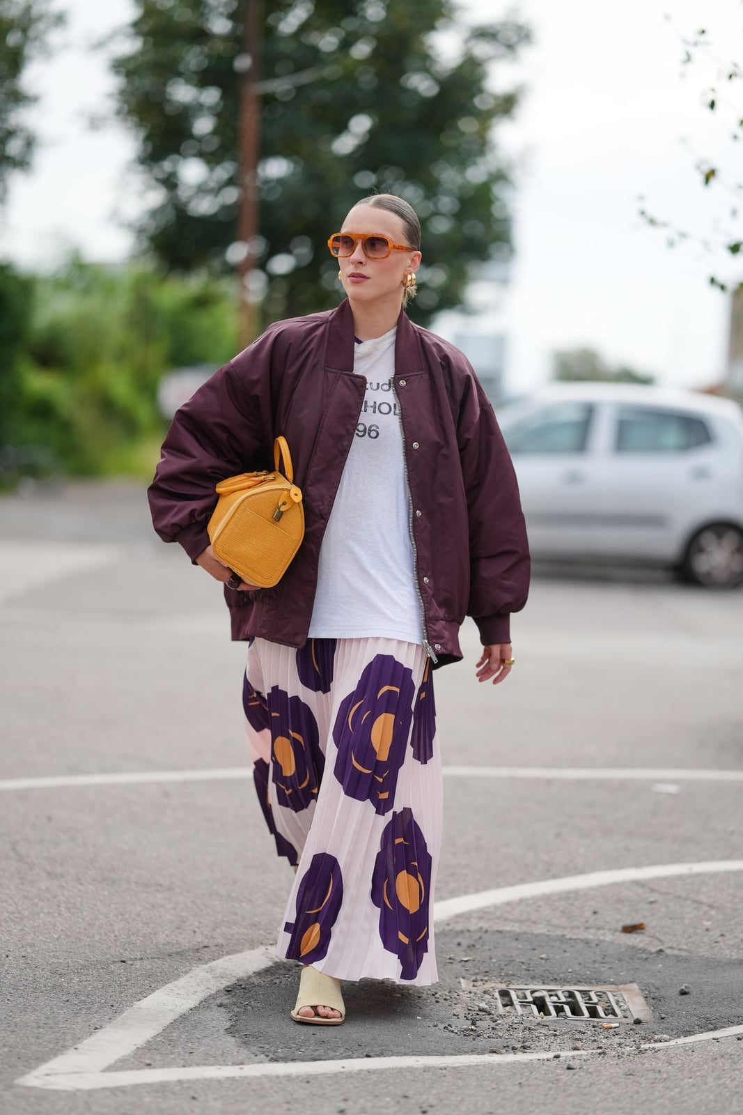 Burgundy bomber jacket with floral print skirt — Classy Jacket Outfits