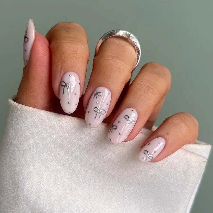 Pale Pink Oval Nails With Silver Bows and Dots — Classy Jelly Nails