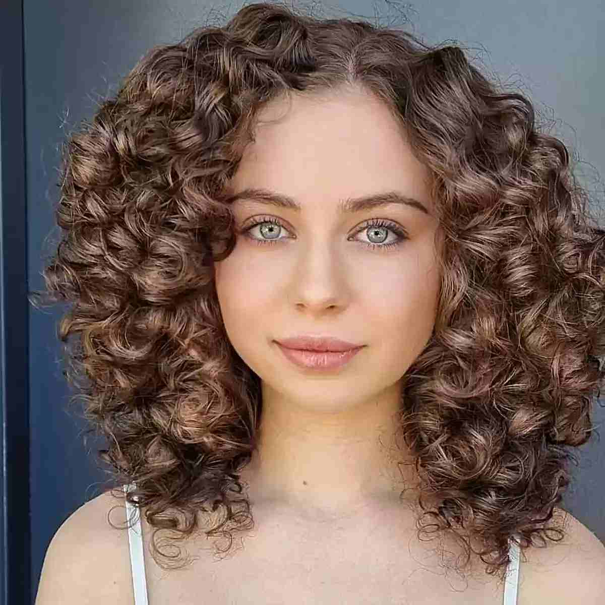 Collarbone Layers with Subtle Highlights Collarbone Layers with Subtle Highlights — Classy Medium Curly Hair