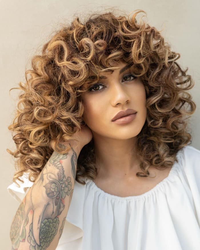 Shoulder Layered Bob with Wispy Bangs Shoulder Layered Bob with Wispy Bangs — Classy Medium Curly Hair
