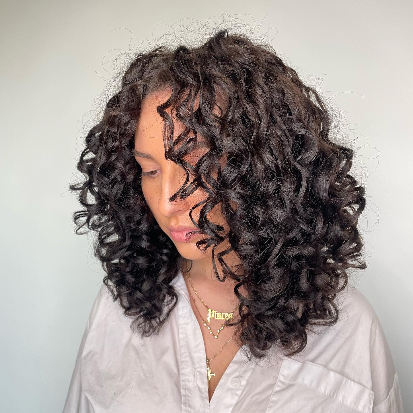 Collarbone Layers with Defined Curls Collarbone Layers with Defined Curls — Classy Medium Curly Hair