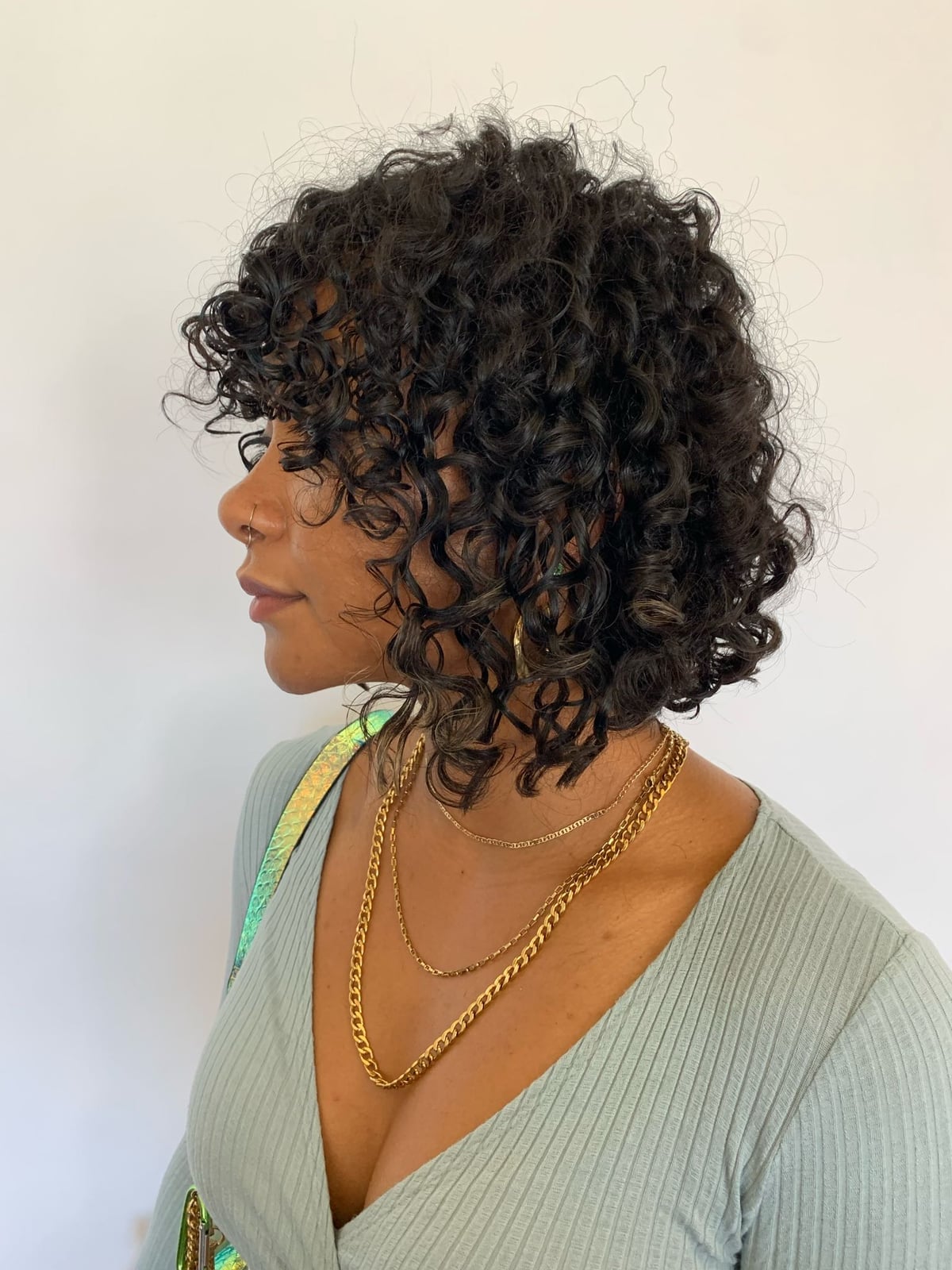 Chin Length Bob with Curtain Bangs Chin Length Bob with Curtain Bangs — Classy Medium Curly Hair