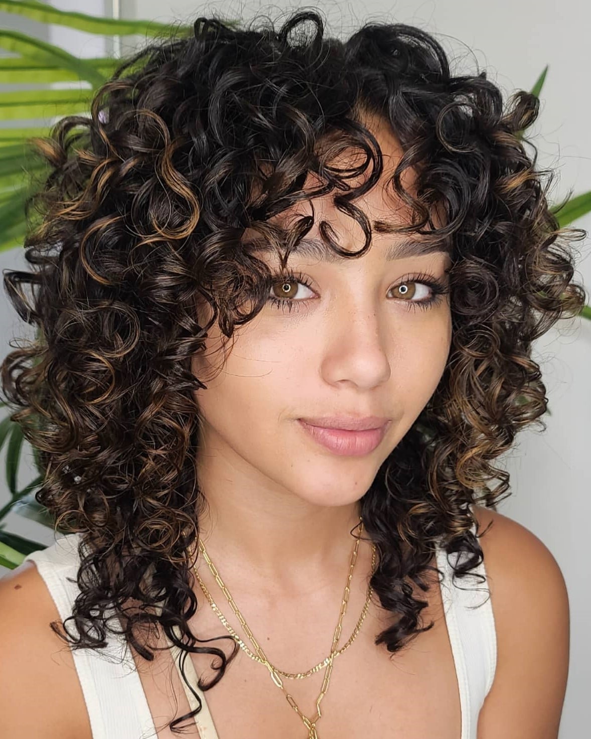 Collarbone Shag with Short Curly Bangs Collarbone Shag with Short Curly Bangs — Classy Medium Curly Hair