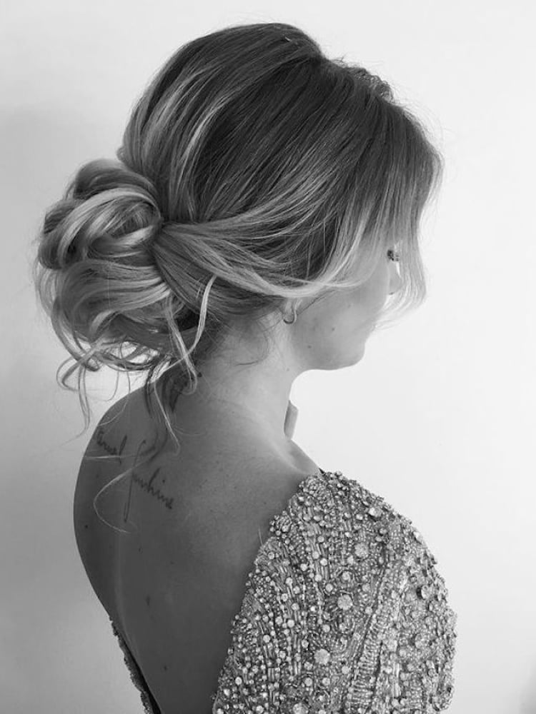 Softly Textured Side Bun with Wispy Bangs — Classy Messy Bun Updo