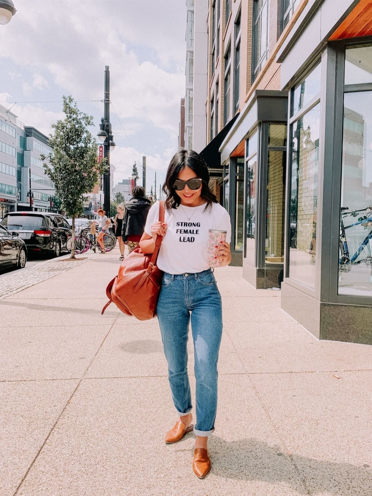 Graphic T-Shirt With Rolled Cuff Mom Jeans Graphic T-Shirt With Rolled Cuff Mom Jeans — Classy Mom Jeans Outfits