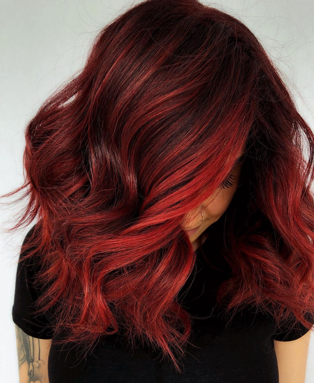 Deep Red Mid-Back with Striking Bright Red Highlights Deep Red Mid-Back with Striking Bright Red Highlights — Classy Red Hairstyles