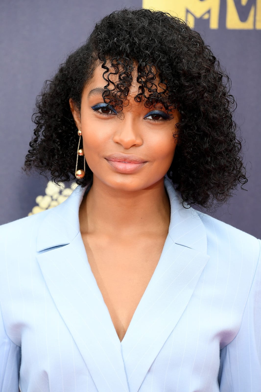 Chin Length Bob With Defined Curly Bangs Chin Length Bob With Defined Curly Bangs — Classy Short Curly Hair