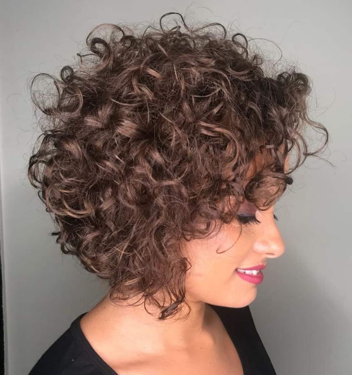 Ear Length Bob With Volume And Short Curly Bangs Ear Length Bob With Volume And Short Curly Bangs — Classy Short Curly Hair