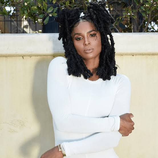 Shoulder Length Coily Locs Two High Buns Shoulder Length Coily Locs Two High Buns — Classy Short Locs