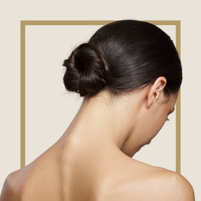Neat Dark Brown Low Slicked Back Bun — Classy Slick Back Hairstyles