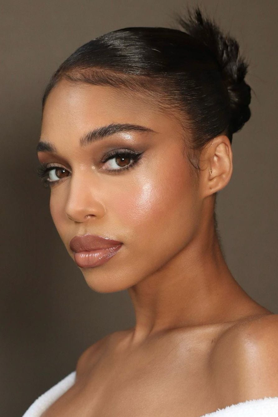 Sleek Dark Hair Low Neat Bun — Classy Slick Back Hairstyles