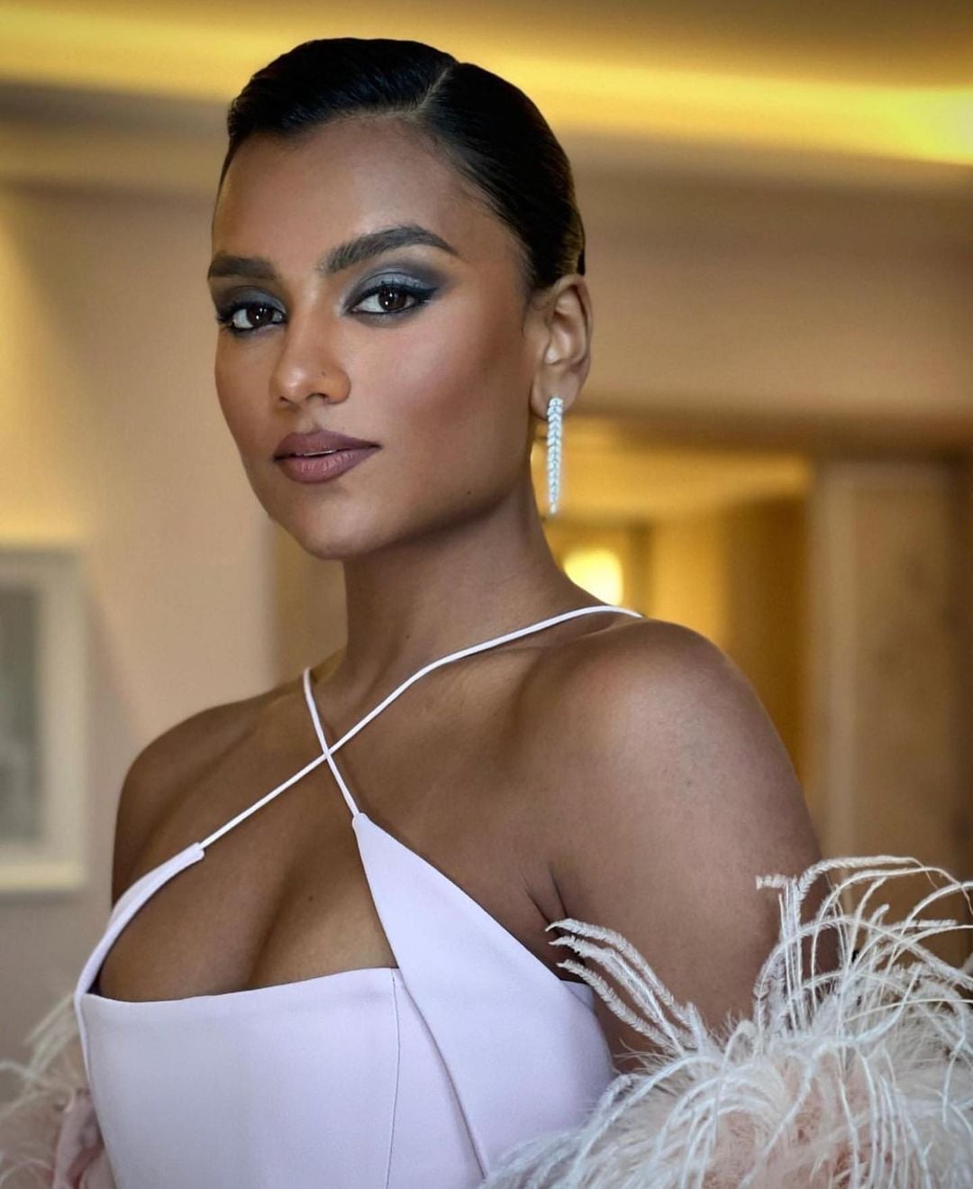 Glossy Dark Brown Slicked Back Hairstyle — Classy Slick Back Hairstyles