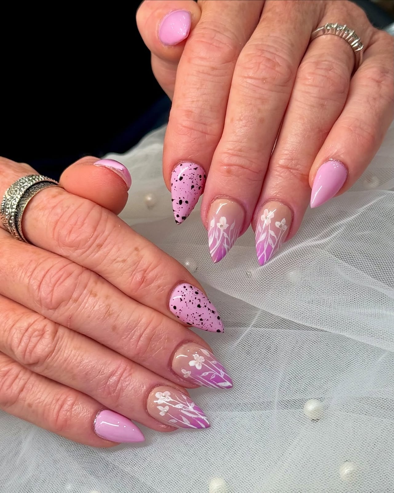 Medium Pastel Pink Stiletto with Floral and Speckled Art — Classy Stiletto Nails