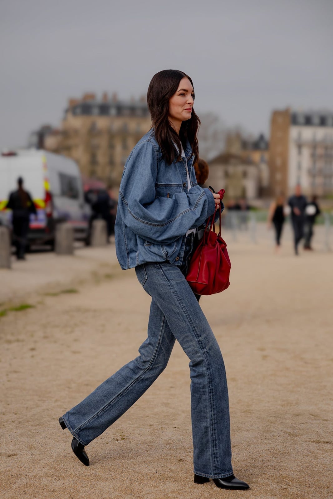 Oversized denim jacket with flared jeans and ankle boots — Classy Streetwear Outfits
