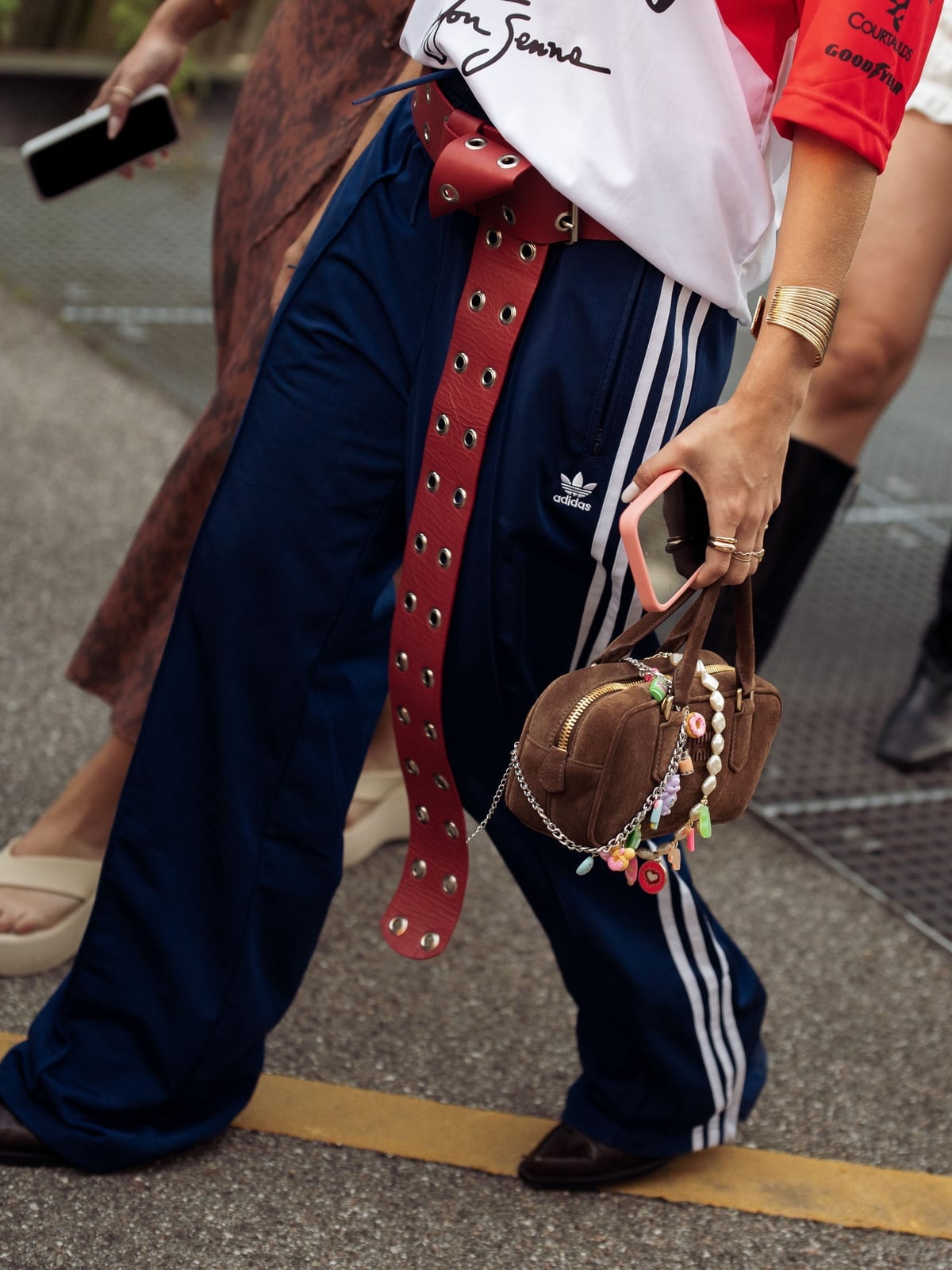 Navy Blue Track Pants With Red Grommet Belt Navy Blue Track Pants With Red Grommet Belt — Classy Sweatpants Outfits